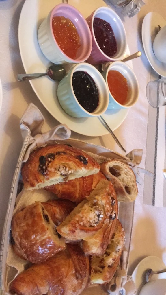 Croissants, pains aux raisins and four pots of jam
