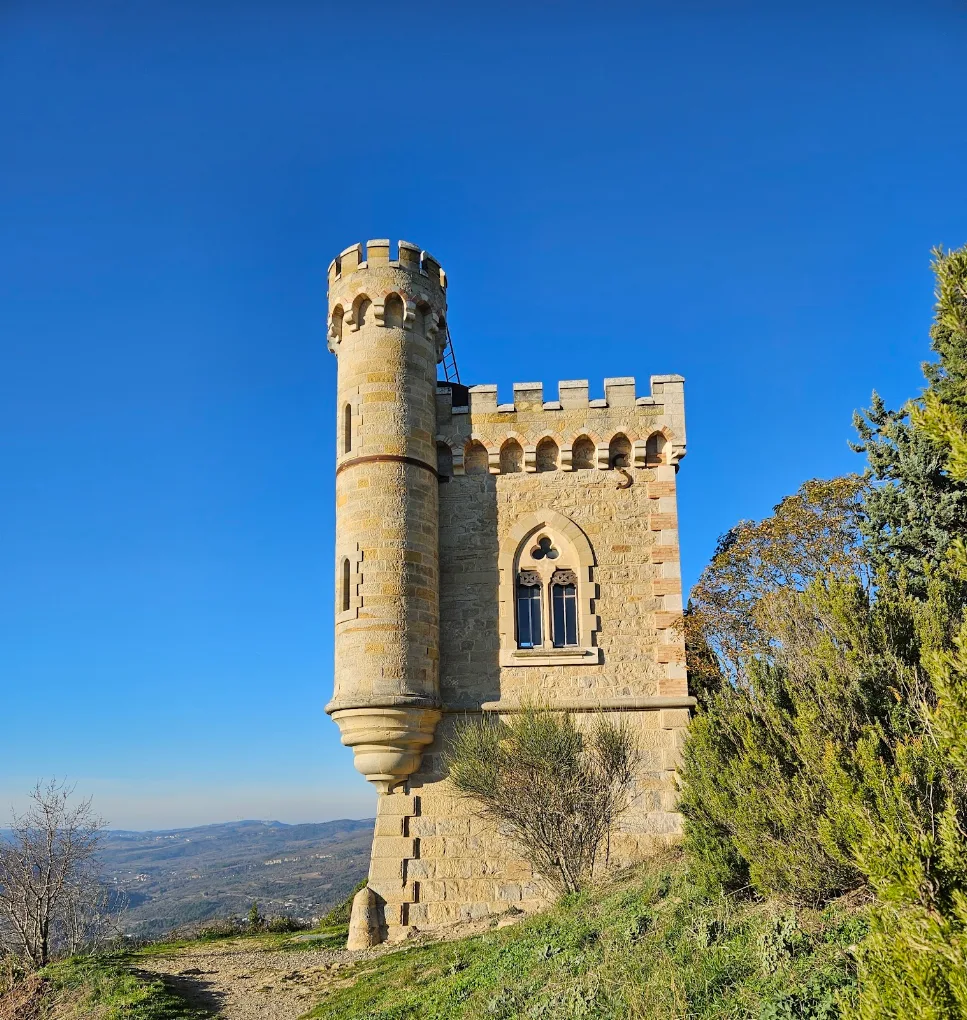 Tour Magdala at Rennes-le-Château against a blue sky